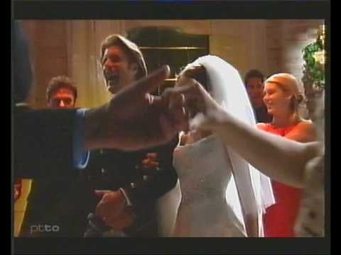 The end scene of Libby and Drew's wedding in Neighbours with the song Will Ye Go Lassie Go. Drew's hair was a unique craft wasn't it! ALL COPYRIGHTS FREMANTLE AUSTRALIA / BBC TV 2001