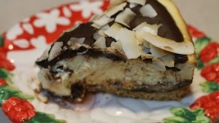 Chocolate Coconut Almond Cheesecake
Subscribe & check out my other videos! www.youtube.com/cookingandcrafting
This was the most delicious cheesecake!! I hope you enjoy! Join my Facebook page! http://on.fb.me/1M2bwEO
CRUST
1 3/4 cups chocolate graham cracker crumbs (I used regular)
1/2 cup finely chopped almonds
1/3 cup C&H sugar
1/3 cup Challenge Butter, melted
CHOCOLATE LAYER
4-ounce bars semisweet chocolate, chopped
6 tablespoons Challenge Butter
1/2 cup C&H sugar
2 tablespoons Bobs Red Mill all-purpose flour
2 large eggs
CHEESECAKE LAYER
4 (8-ounce) packages Challenge Cream Cheese, softened
1 cup C&H sugar
1 teaspoon coconut extract
4 large eggs
1 cup sweetened flaked coconut
GANACHE
1 4-ounce bar bittersweet chocolate, chopped
1/4 cup heavy whipping cream
Garnish: Toasted coconut flakes
CRUST
Preheat oven to 300°. In a medium bowl, combine cracker crumbs, almonds, and C&H sugar. Add melted Challenge Butter, stirring to combine. Press mixture into bottom and up sides of a 10-inch springform pan.
Bake for 8 minutes.
CHOCOLATE LAYER
In a small saucepan, combine semisweet chocolate and Challenge Butter. Cook over medium-low heat, stirring constantly, until melted and smooth. Add sugar and Bobs Red Mill flour, whisking until smooth. Add eggs, whisking until combined. Pour mixture into prepared crust. Bake for 15 minutes or until barely set. Cool for 30 minutes.
CHEESECAKE LAYER
In a large bowl, beat Challenge Cream Cheese, C&H sugar, and coconut extract at medium speed with a mixer until creamy. Add eggs, one at a time, beating well after each addition. Stir in coconut. Pour mixture over chocolate layer; bake for 1 hour and 10 minutes. Cool for 2 hours on a wire rack.
GANACHE
In a small saucepan, combine bittersweet chocolate and cream. Cook over medium-low heat, stirring constantly, until smooth; spoon over cheesecake. Chill for at least 4 hours. Garnish with coconut, if desired. Store cheesecake, covered, in refrigerator up to 3 days.
I upload new videos every Monday and Thursday.
Check out my website! http://www.cookingandcrafting.com/
Please dont forget to like, share, favorite and comment my video!
Subscribe here: http://bit.ly/12Lkz6X
Facebook: http://on.fb.me/1M2bwEO
Pinterest: http://tinyurl.com/kgooof5
Instagram: http://tinyurl.com/l2wmdbr
Google Plus: http://tinyurl.com/oyylaon
My vlogging and on the go channel: http://tinyurl.com/lagmt3r
Get a month of wine FREE: http://curebit.com/x/lv2rRW
My Zazzle store: http://www.zazzle.com/cookingandcrafting
Aloha, welcome to my kitchen. Im located in the beautiful state of Hawaii. You can expect fast & easy breakfast, lunch, dinner, desserts & crafts that even a kid can help with. As you are in my kitchen, you will experience the sounds of a real household in the background, giving you that homey feel. Do not expect a fancy show or episode, I am just me. A down to Earth, local girl who always keeps it real.
Please check out my bestie YT friend, Tammy (yoyomax12):
http://tinyurl.com/3vzgpca Tammy and I have been friends for many years and met here on YouTube!
Also check out Jenn of cupcakesandcardio. You will love her as well. http://tinyurl.com/lahtvfp
Lastly, smile! I love it when you smile :)
For business inquiries, contact Beth at cookingandcrafting@gmail.com Chocolate Coconut Almond Cheesecake