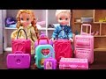 Elsa and Anna toddlers go on holidays and pack their suitcases