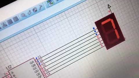 Practica #7 decodificador 7447, display de 7 seg, clock y compuerta 74LS90