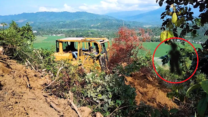 Very Extreme! D6r XL bulldozer operator builds a new road on a very steep mountain cliff