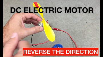 How can the direction of the DC motor be changed?