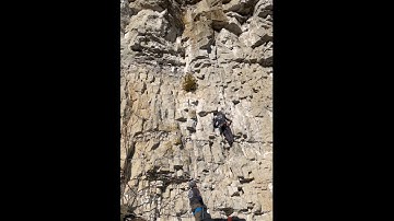 Ric climbing Exposure Plus (5.9) - Smegma Crag at Rattlesnake Point.