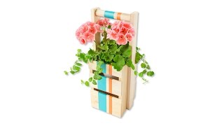 DIY Tall Plant Tote This DIY tall flower tote, is a quick and easy project. Learn how to make this wooden plant container and carrier with the detailed