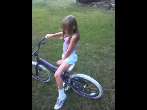 Robyn getting on bike