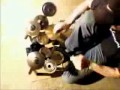 Guy rocks on miniture drum set