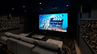 Домашний кинозал в подвале таунхауса с проектором JVC, экраном 158" и Dolby Atmos