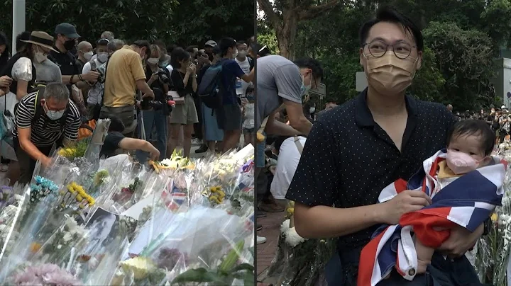 Huge queue as Hong Kongers mourn Queen Elizabeth I...
