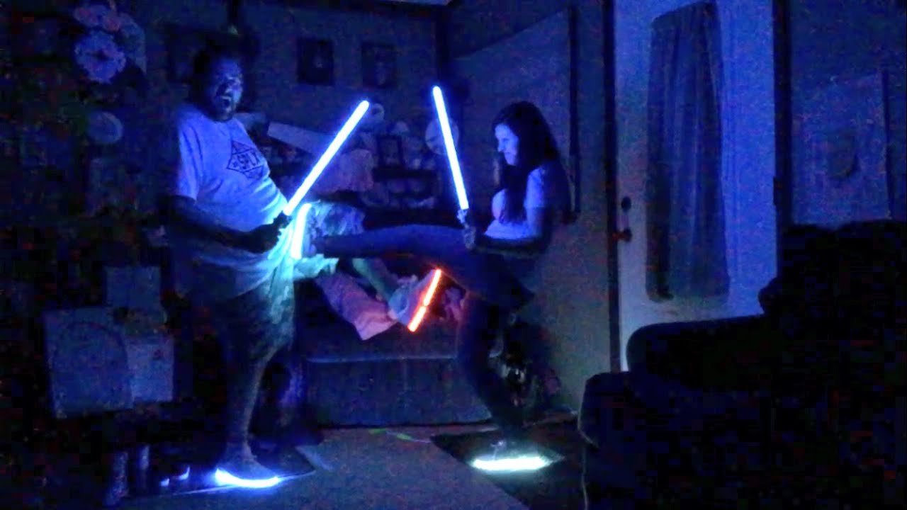HILARIOUS LIGHT UP LED SHOES LIGHT SABER BATTLE - YouTube