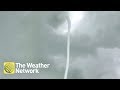 Impressive "ROPE FUNNEL CLOUD"trailing from the sky in Saskatchewan