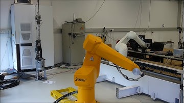 Time-optimal tube following with an industrial robot