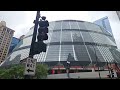 Chicago loop walk  contruction workers clinging to leaning scaffolding dangling on salesforce tower