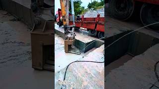 Excavator Lifting Huge Stone Blocks!