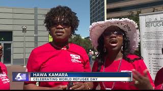 Community members gather for world refugee day at Grove Plaza
