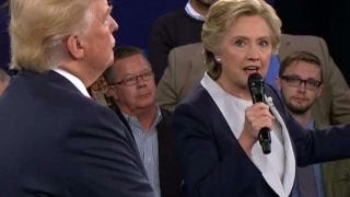 Trump, Clinton clash on economics
