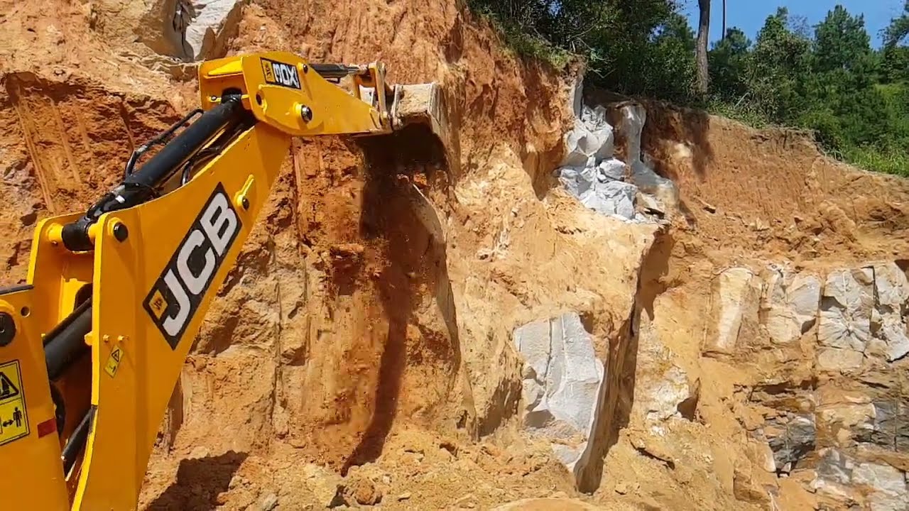 jcb working in a stone quarry || jcb digging rock || jcb vs rock || jcb video