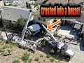 Big truck rolled down a hill and crashed into a house!