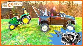 Tow truck rescue with kids ride on toy truck and tractor. Educational how winches work | Kid Crew