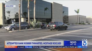 Attempted bank robber thwarted, hostage rescued