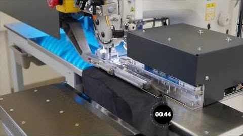 Darts and pleats machine