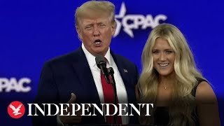 Watch moment Trump welcomes anti-trans swimmer onstage at CPAC