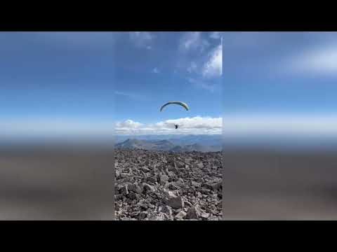 Hillwalker fast-tracks his way back down Ben Nevis - by paragliding off the iconic mountain