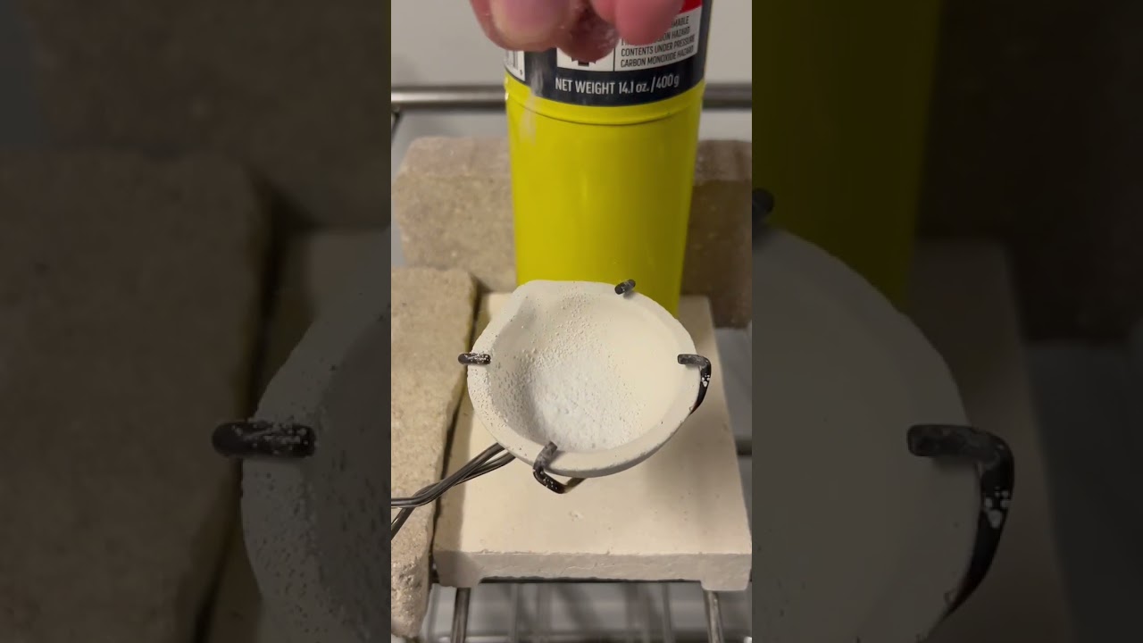 Glazing the crucible to melt silver. 