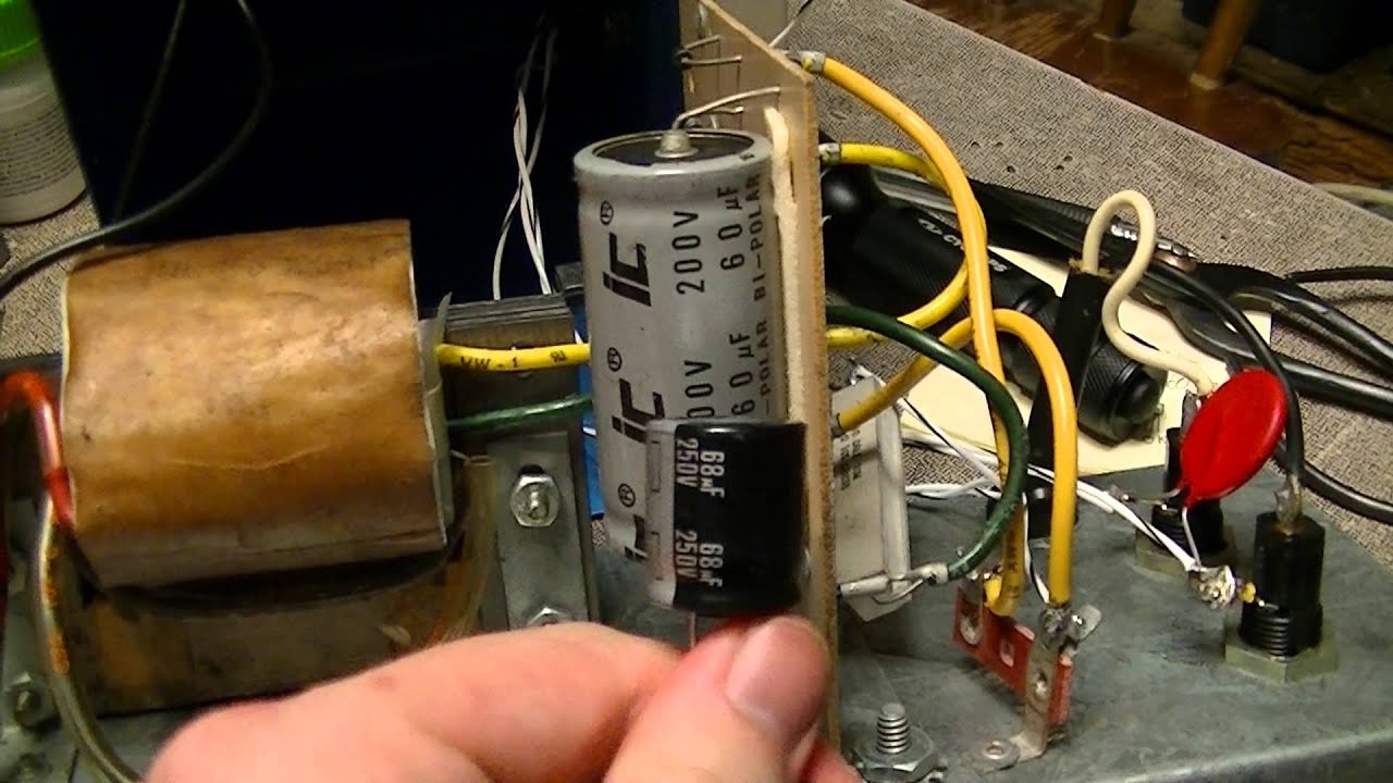 Universal Cooperatives Super 2000 electric fence controller guts - YouTube