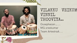Vilakku vekkum vinnil thooviya tabla cover