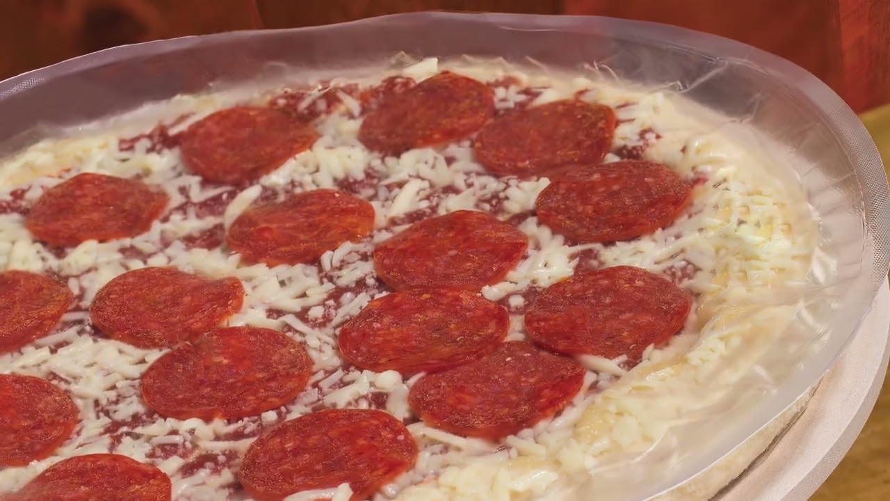 Pizza making, processing and packaging with Reiser equipment