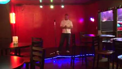 Justin Skeens singing Karaoke