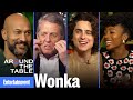 Wonka cast recall hugh grants oompa loompa dance  around the table  entertainment weekly