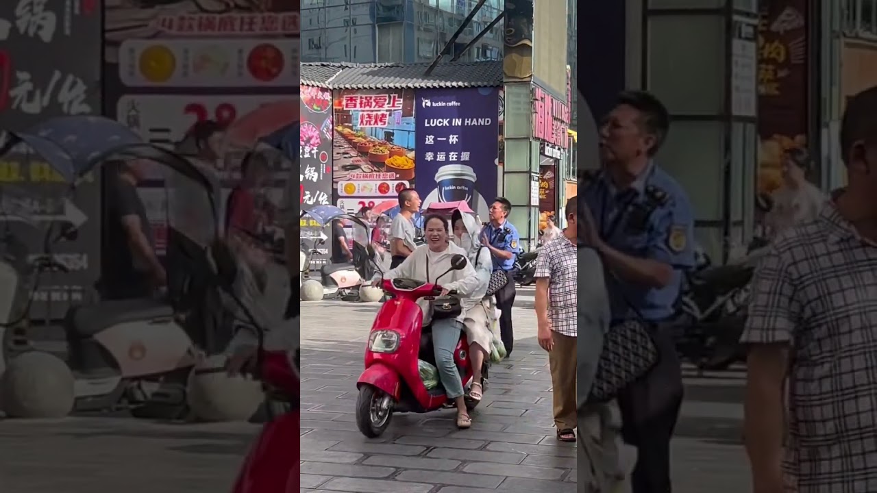 3109: Street vendor cries upon seeing city management in China