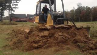 John Deere 450j Dozer Removing Terrace in Field