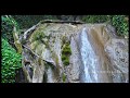 Vertical flight along the waterfall, mountain gorge "33 waterfalls"