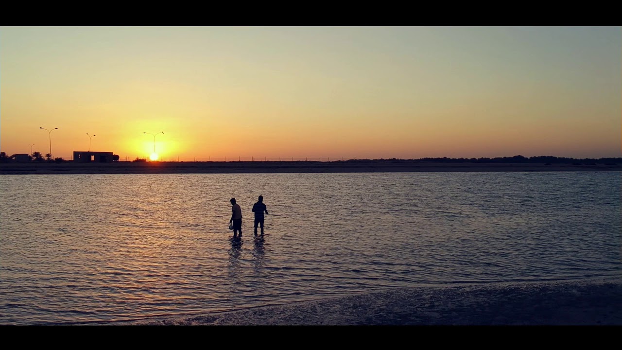 DJI Spark flying low over water