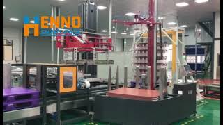 HENNOPACK EMPTY BOTTLE PALLETIZING SYSTEM WITH SLIP SHEET DISPENSER AND STRAPPING MACHINE