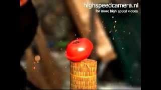 Tomato cut by samurai sword in super slow motion