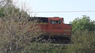 CSX Q020 Train Passes BNSF Powered CSX K040 Train