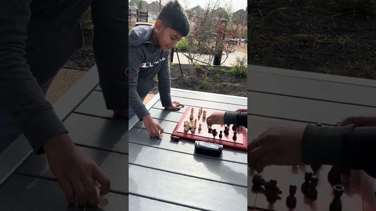 Boys teaching me chess