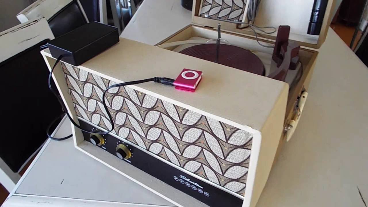 Silvertone Stereo portable record player playing iPod