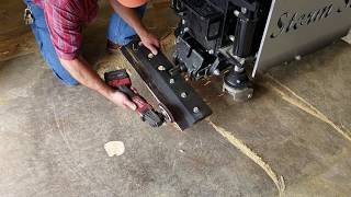 Sharpen your floor scraper blade on the job!