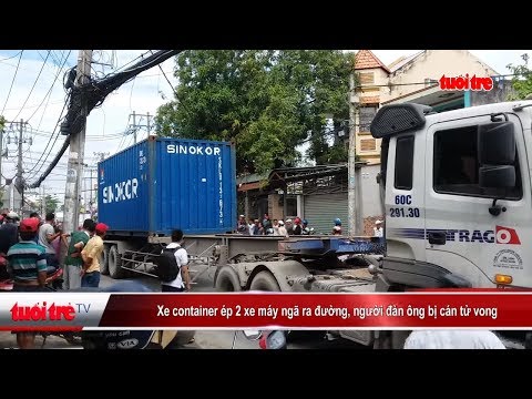 Video Xe container ép 2 xe máy ngã ra đường, người đàn ông... - youtube