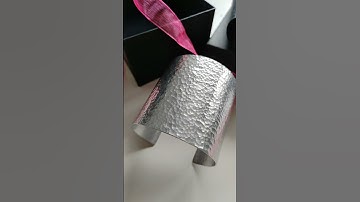 Making my wide hammered bracelet.