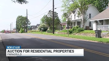 City to auction off residential properties