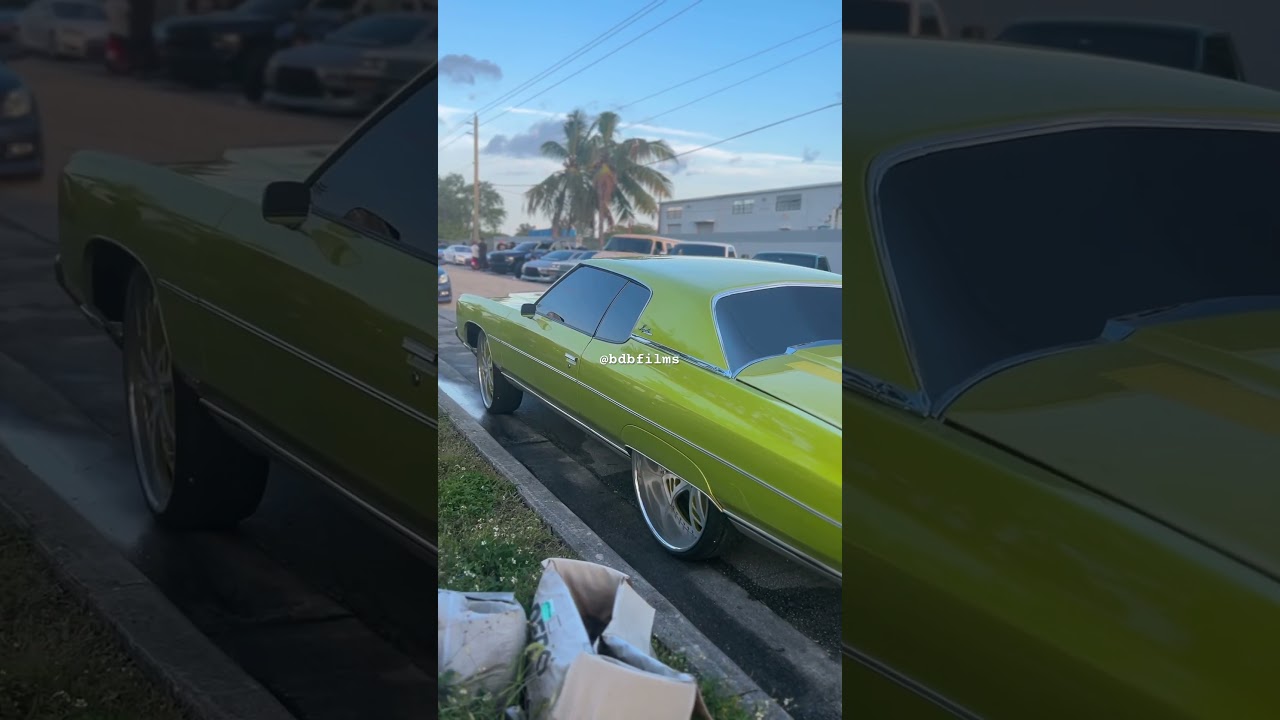 Lime Gold 71 Impala hard top on 26 inch Corleone Forged wheels