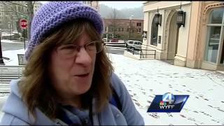 Folks enjoy a long-awaited snow in Asheville