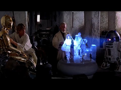 R2-D2 plays the ABBA hologram for Luke and Obi-Wan.