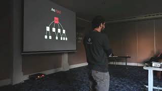 DAOstack CEO Matan Field speaking at ETHfinex Governance Summit 2018