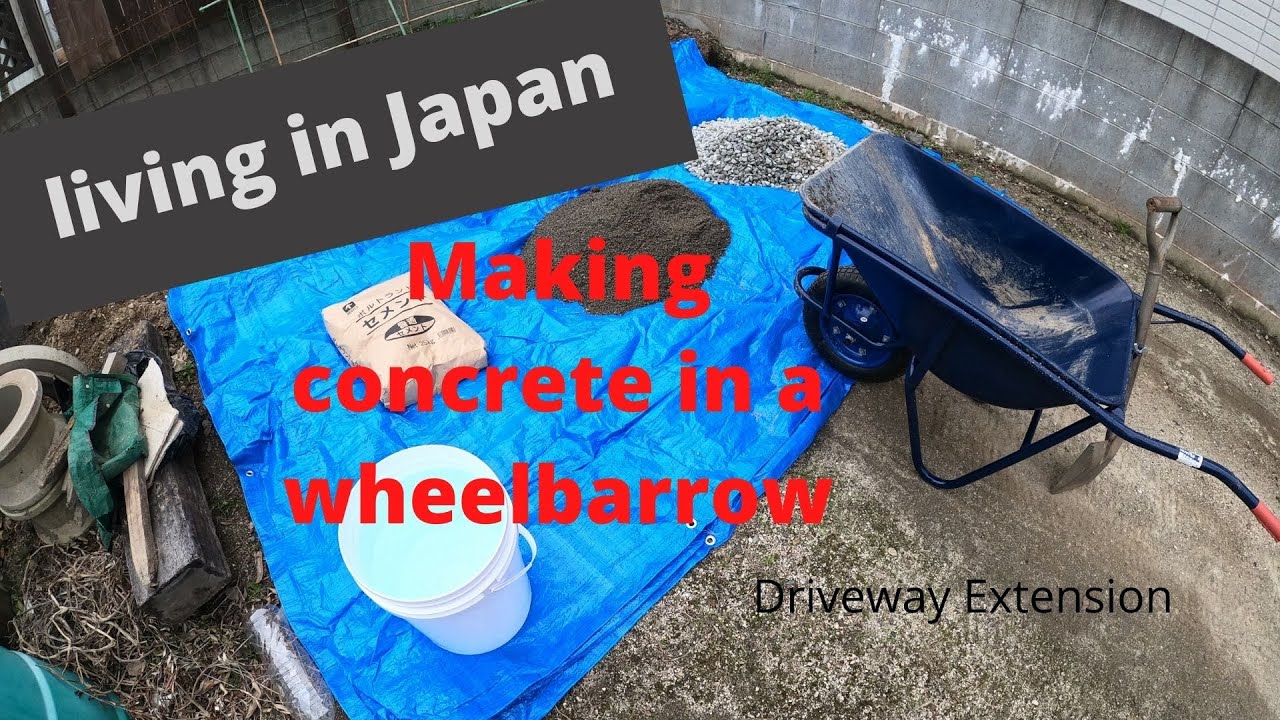 Mixing concrete in a wheelbarrow! Driveway extension while living in